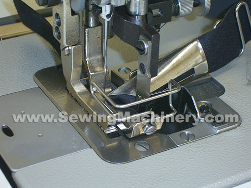 how to ajust the long trimer in swf embroidery machine